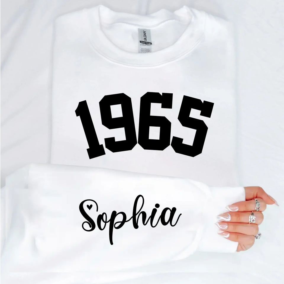 Custom Year 1965 - 60th Birthday Women Sweatshirt with Name on Sleeve