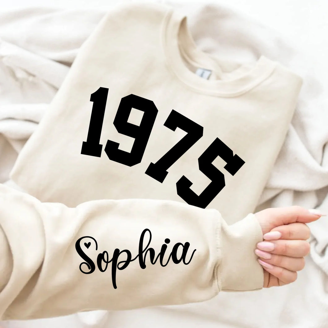 Custom Year 1975 - 50th Birthday Women Sweatshirt with Name on Sleeve