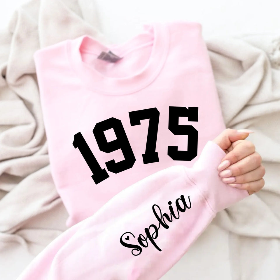 Custom Year 1975 - 50th Birthday Women Sweatshirt with Name on Sleeve